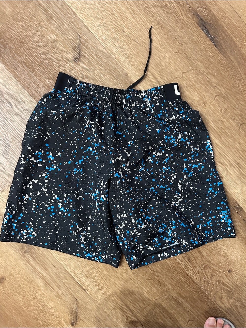 Under Armour Black Athletic Shorts with Blue and White Splatter